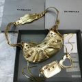 Balenciaga 700940210 Women’s Neo Cagole XS Handbag in gold Arena lambskin