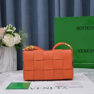 Bottega Veneta BV 666870 Cassette Intreccio grained leather cross-body bag Orange